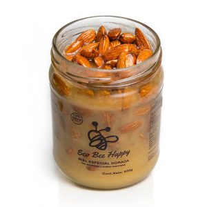 Miel especial dorada con almendras y aceites esenciales.